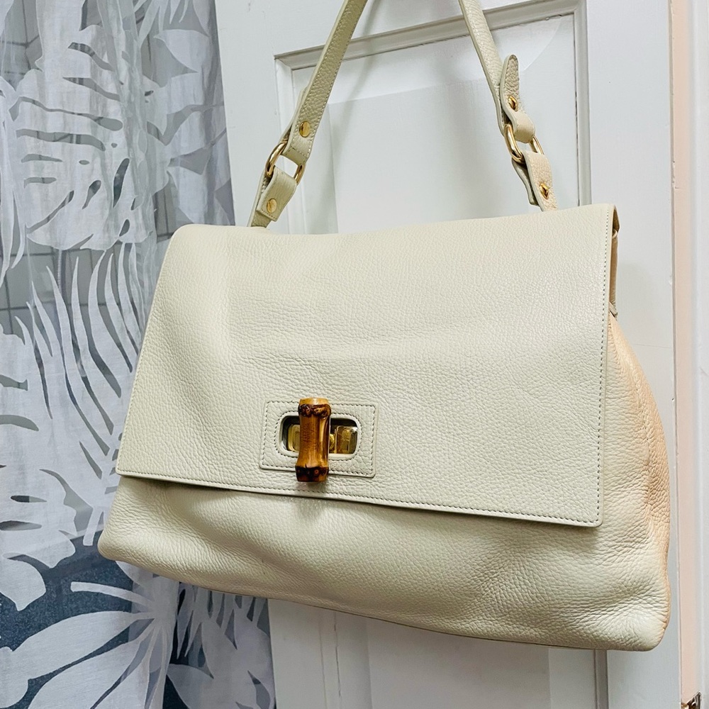 Brand new Italian calfskin bag with real bamboo clasp.